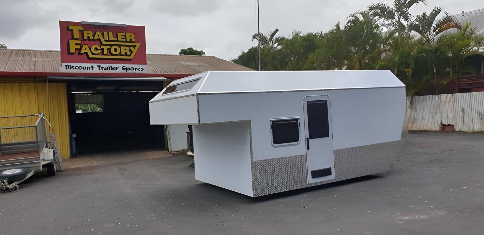 A White Trailer Is Display In Front Of A Trailer Factory — Hastings Trailer Centre in Port Macquarie, NSW