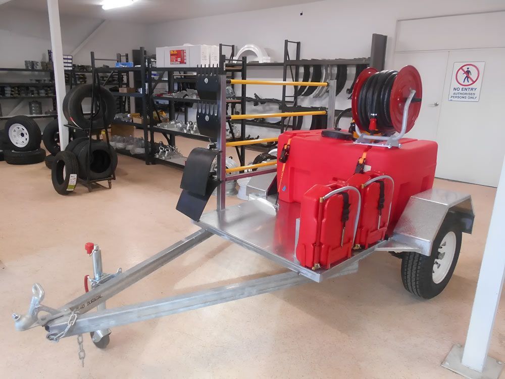 A trailer with a hose reel attached to it Hastings Trailer Centre in Port Macquarie, NSW
