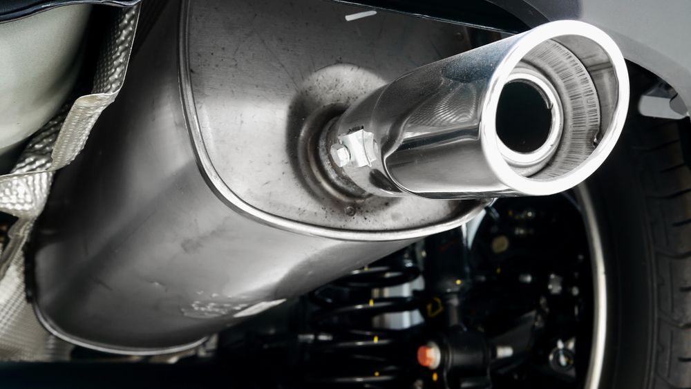 Exhaust Pipe With Chrome Tip Attached — Jims Auto Care in Berrimah, NT