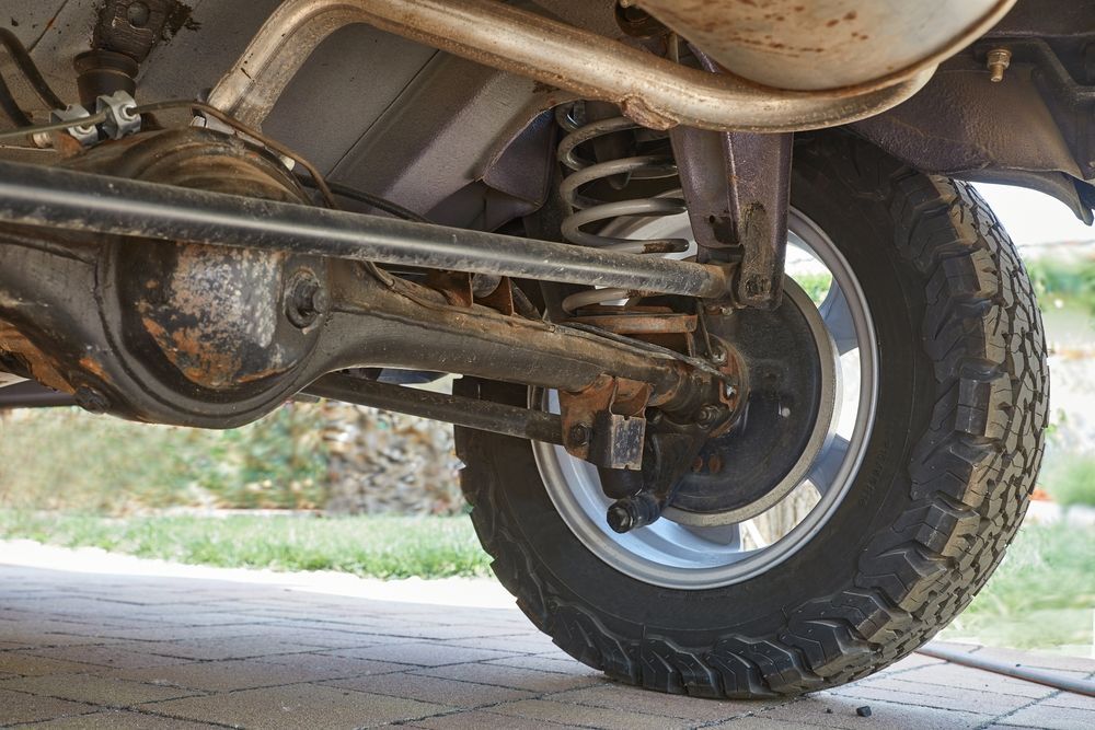 Undercarriage of a Vehicle Showing a Wheel, Suspension — Jims Auto Care in Berrimah, NT