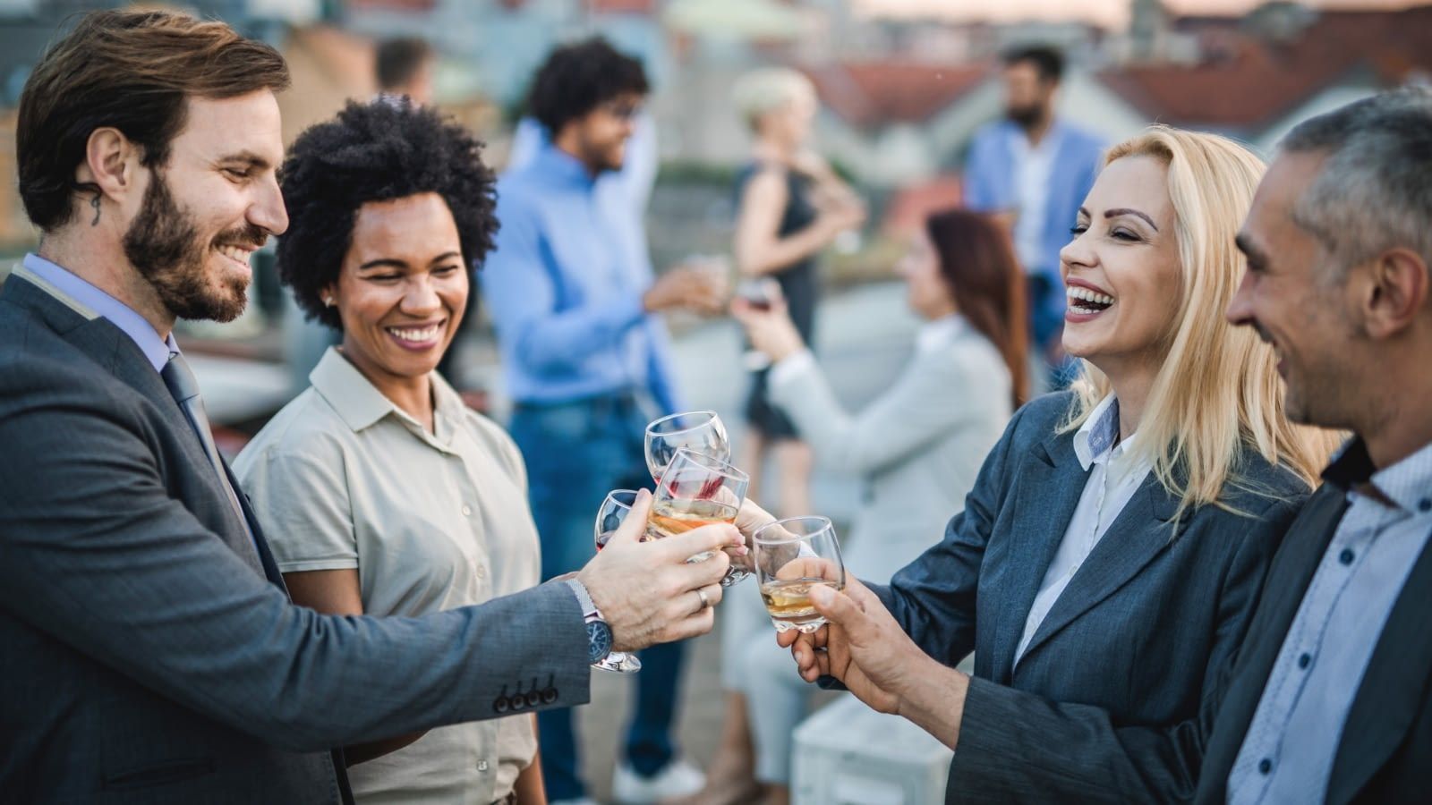 stress-free corporate events employees toasting at corporate event