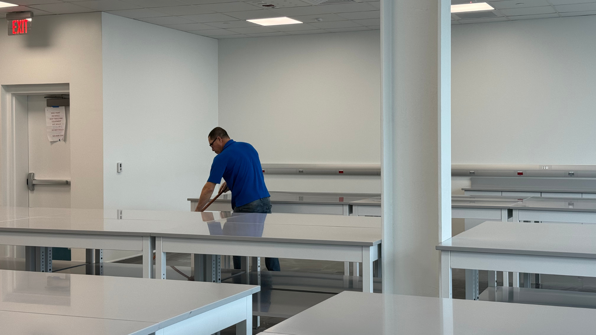cleaner cleaning an office in Cambridge Massachusetts