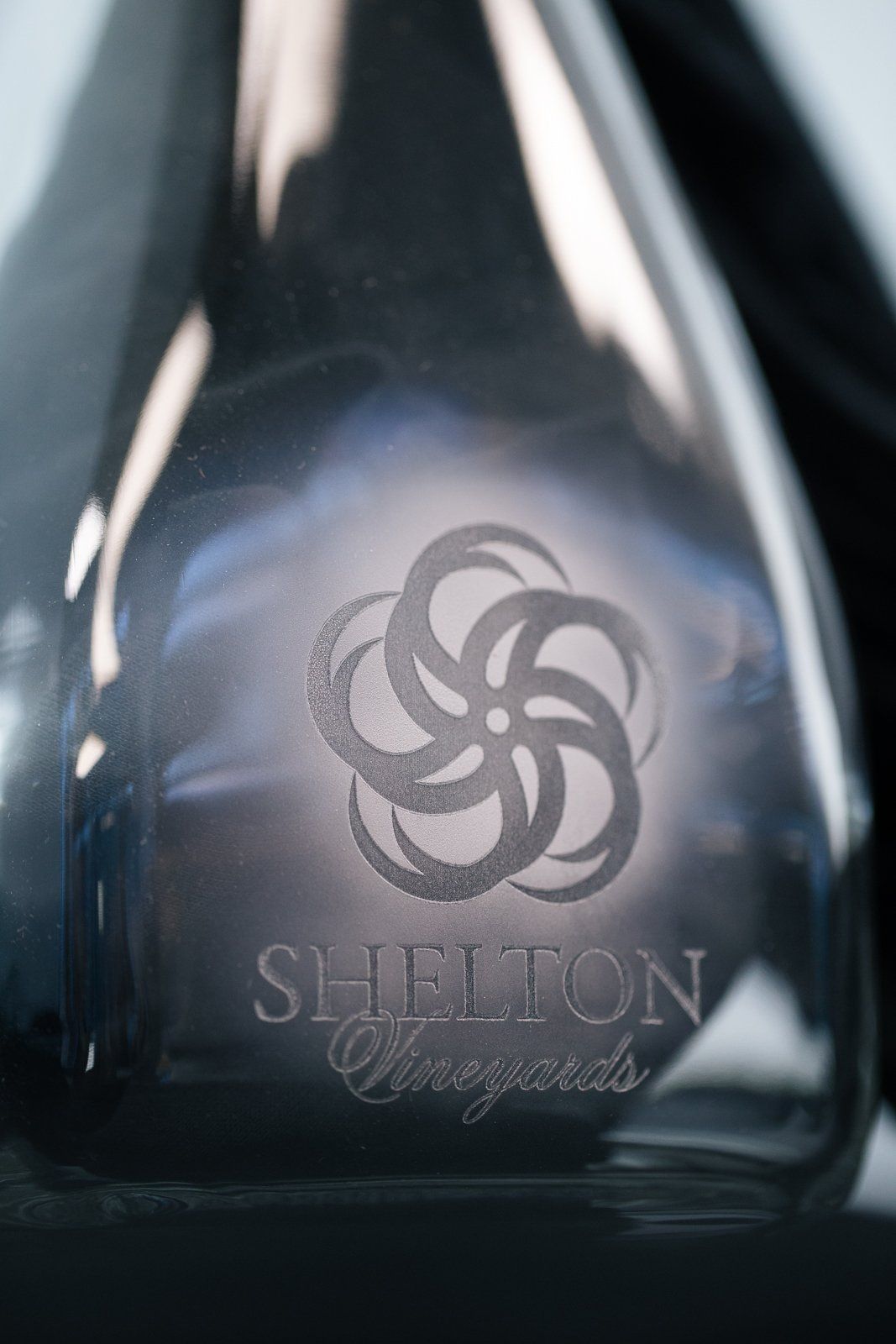 Laser engraved wine bottle with Shelton Vineyards logo