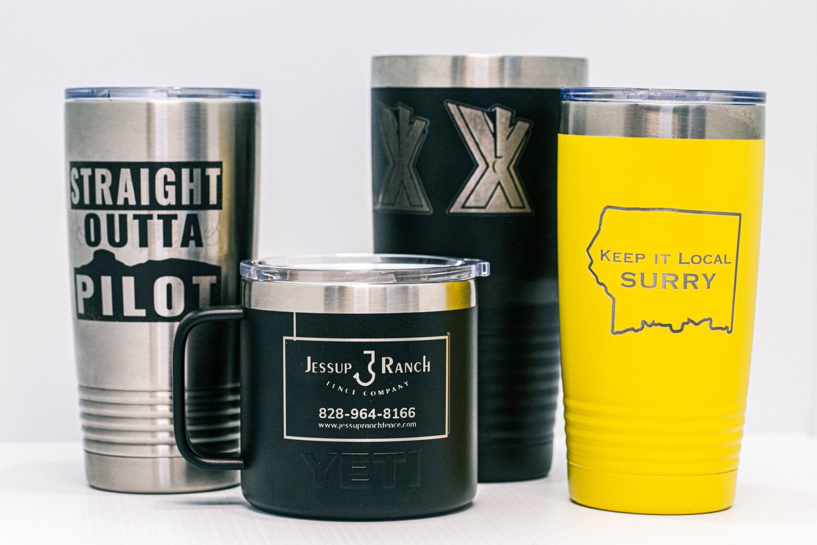 A variety of laser engraved tumblers