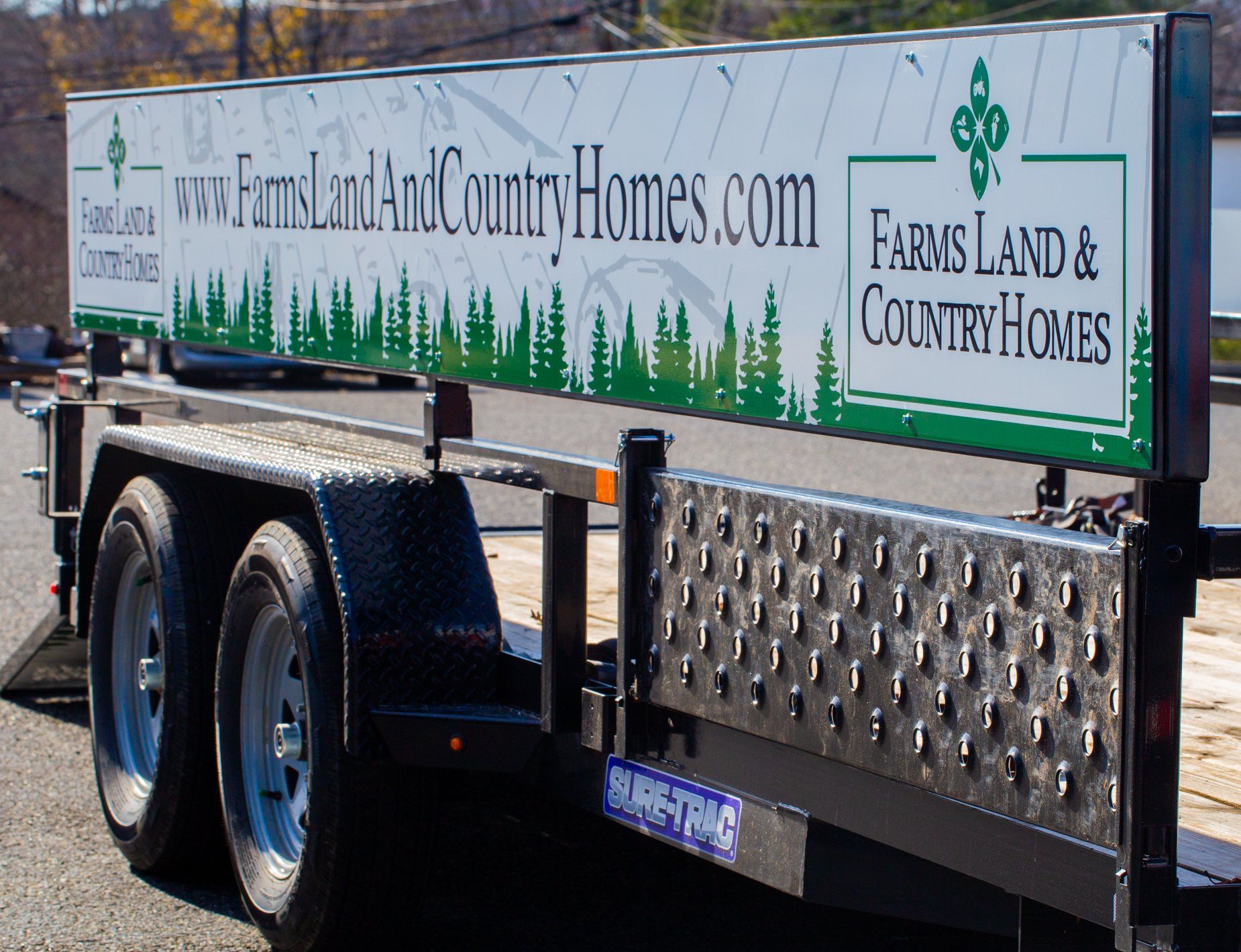 Sign built onto trailer for realty business
