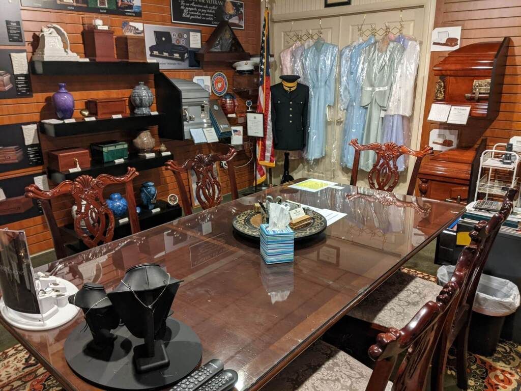 a room with a table and chairs in it