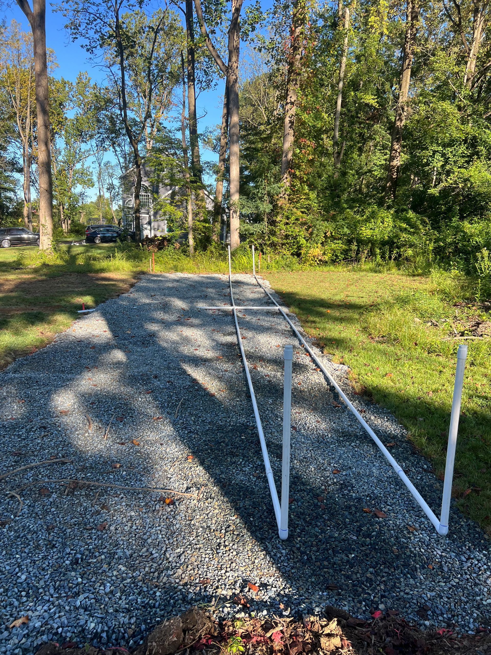Gravel RV parking pad with PVC frame