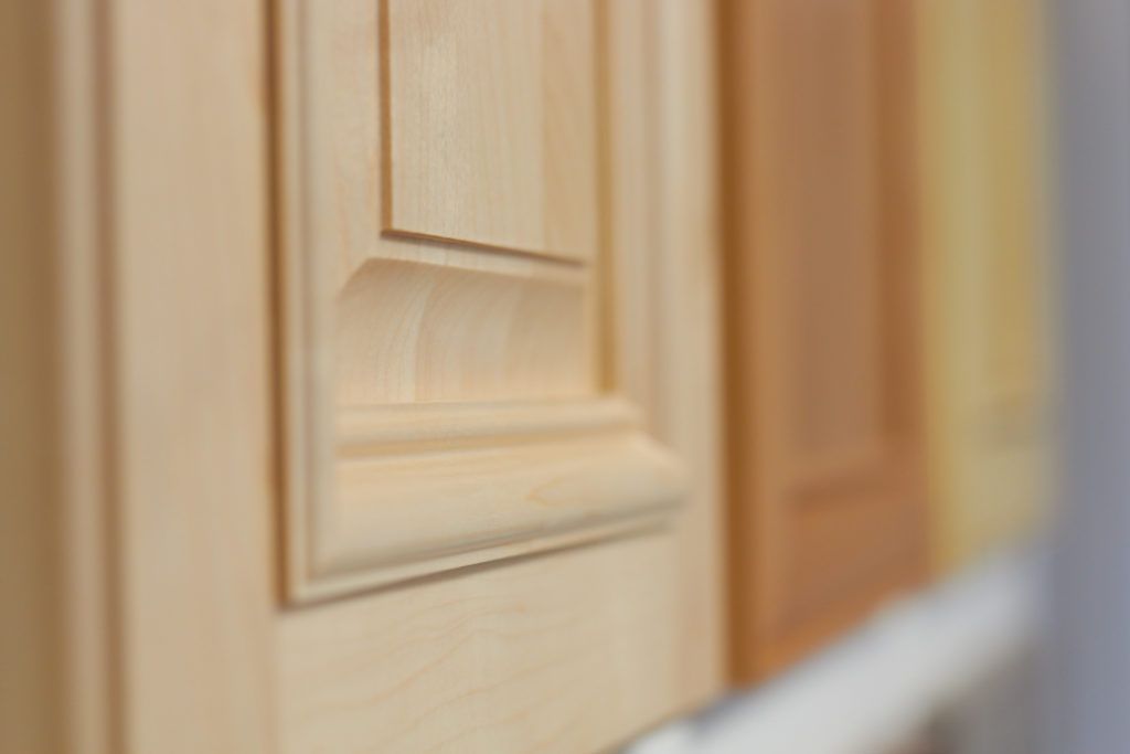 a close up of a wooden door in a store .