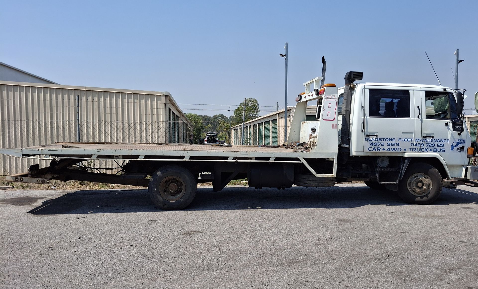 Silver Truck Bed, White Cab, Yellow Safety Stripe — Gladstone Fleet Maintenance In Gladstone, QLD