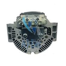 A close up of a alternator on a white background.