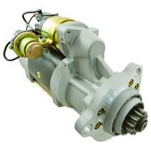 A close up of a starter motor on a white background.