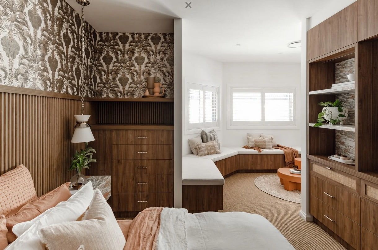 A Modern Bedroom Transitions Into a Cozy Seating Nook — PKJ Design in Unanderra, NSW