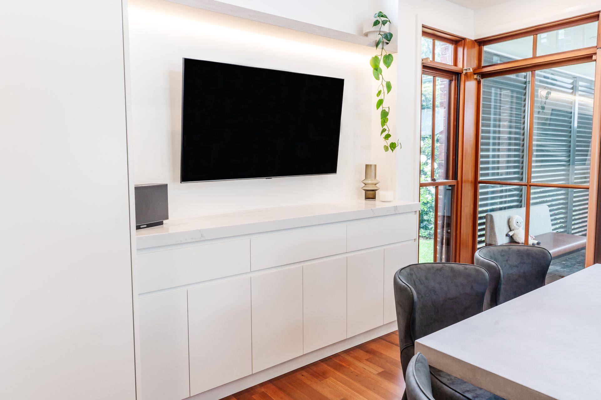 Modern Living Room With Wall-mounted TV — PKJ Design in Unanderra, NSW
