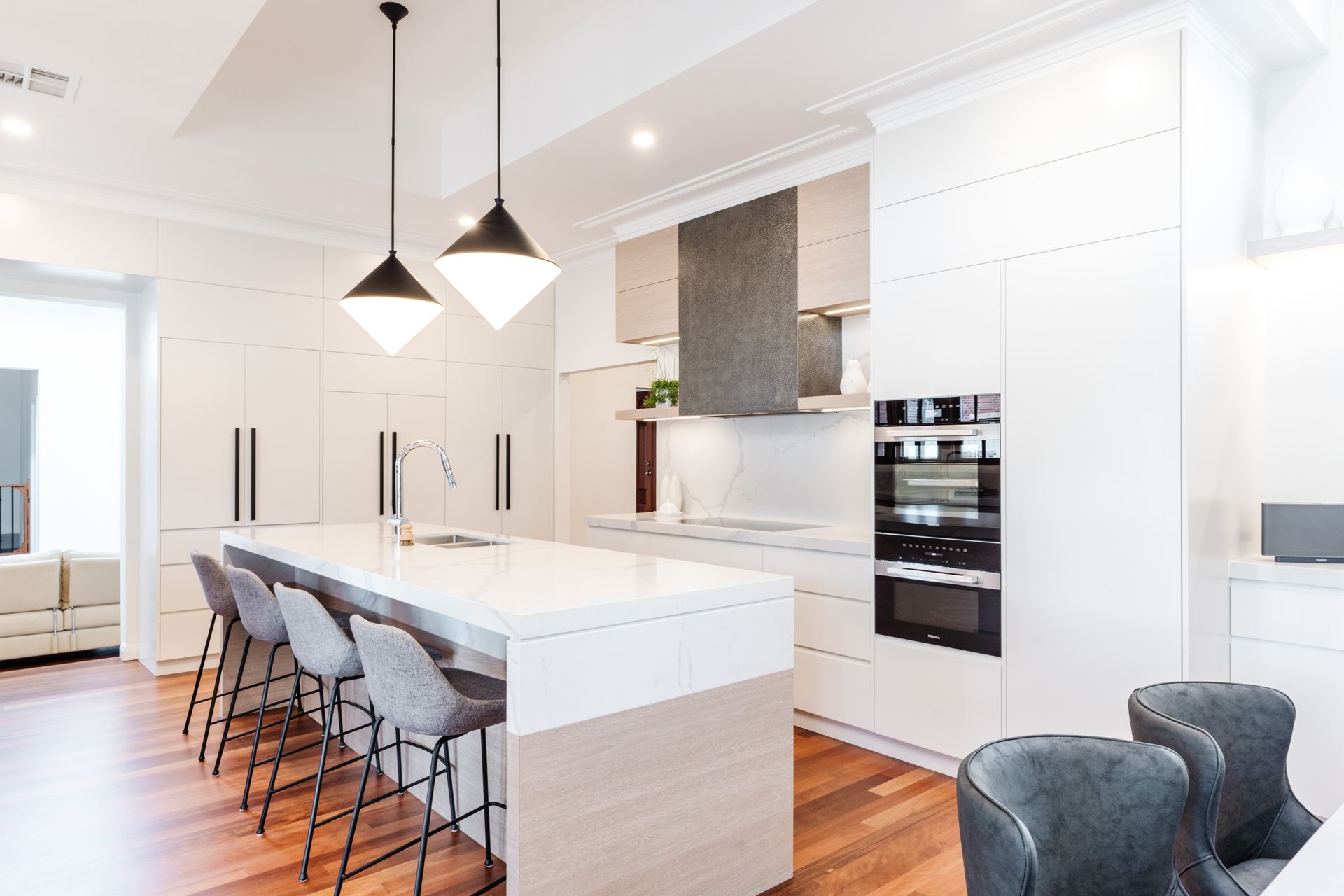Bright Modern Kitchen With White Cabinets — PKJ Design in Unanderra, NSW