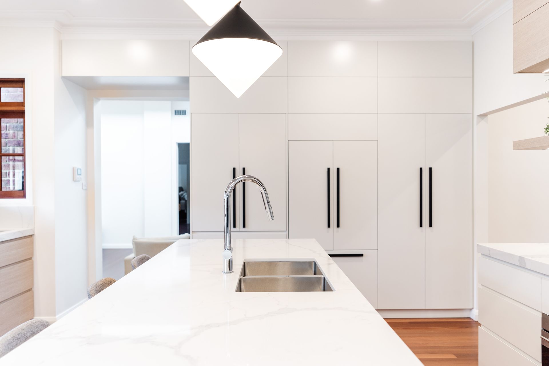 Bright Modern Kitchen With White Island — PKJ Design in Unanderra, NSW