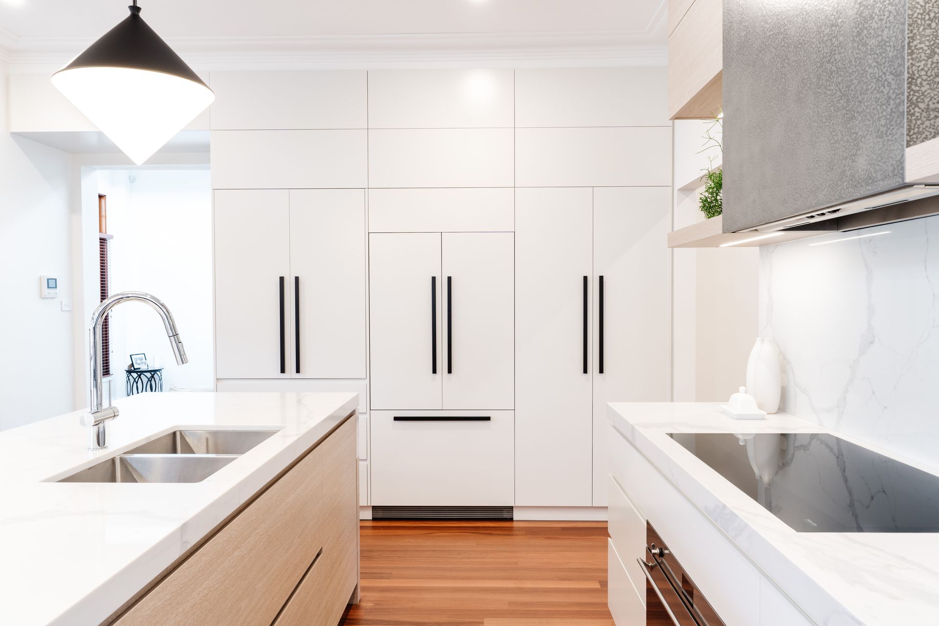 Bright Modern Kitchen With White Cabinets — PKJ Design in Unanderra, NSW