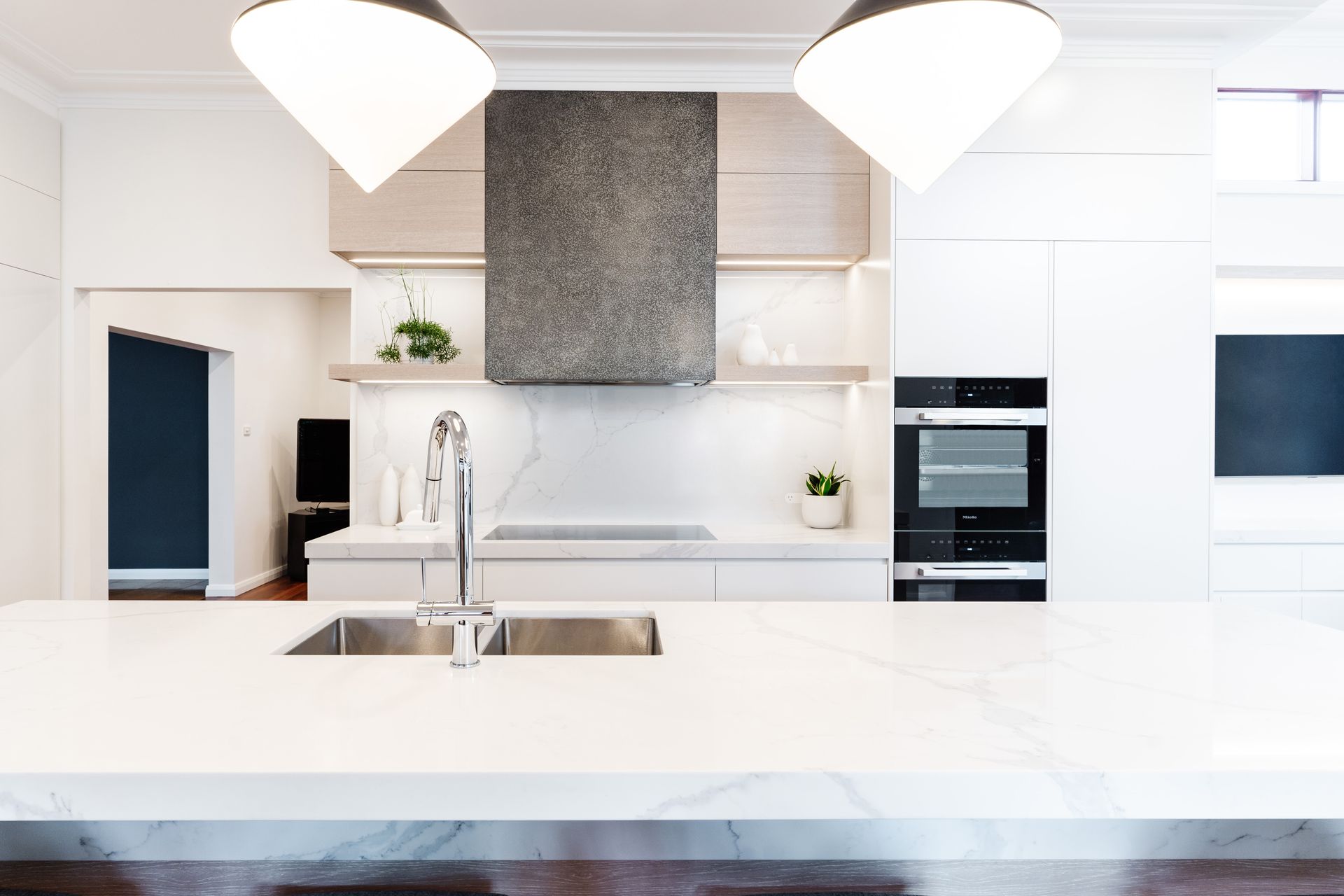 Modern White Kitchen With Marble Island — PKJ Design in Unanderra, NSW