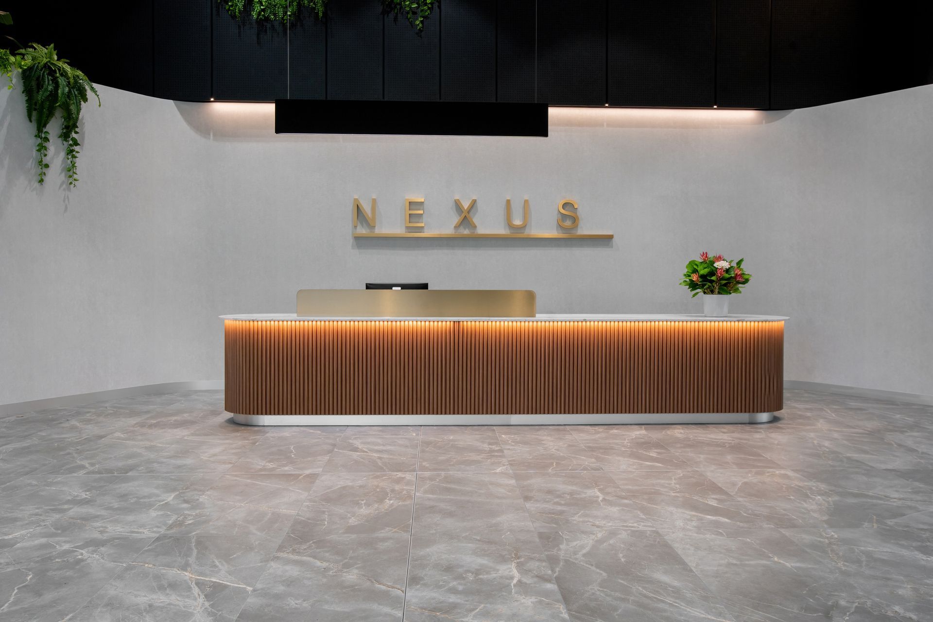 Modern Lobby Reception Desk With Wood Front — PKJ Design in Unanderra, NSW