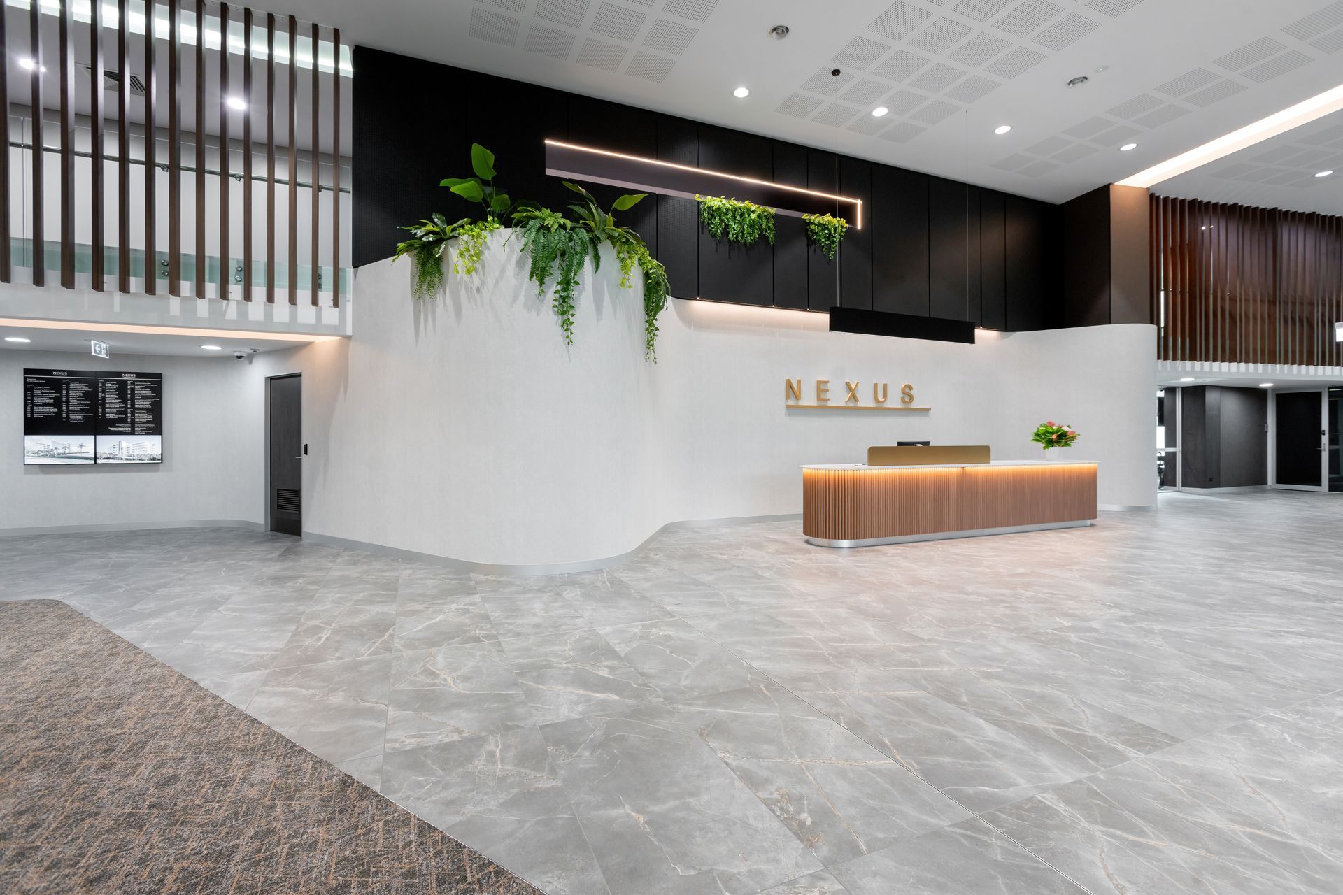 Modern Office Lobby With White Curved Walls — PKJ Design in Unanderra, NSW