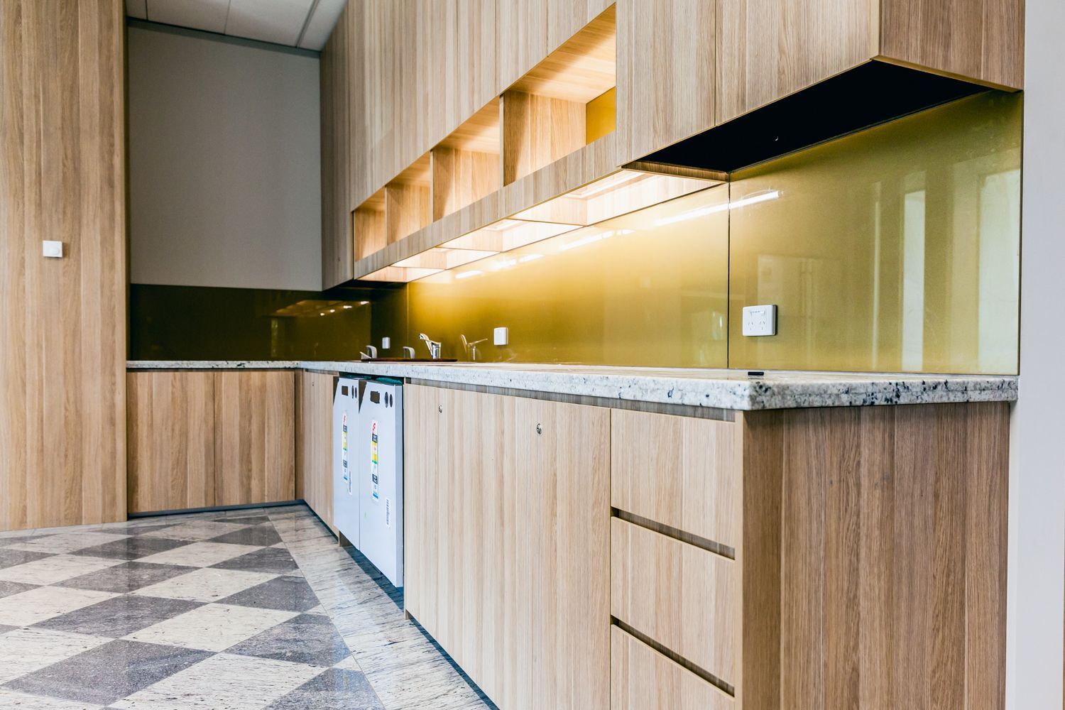 Modern Kitchen With Wood Cabinets — PKJ Design in Unanderra, NSW
