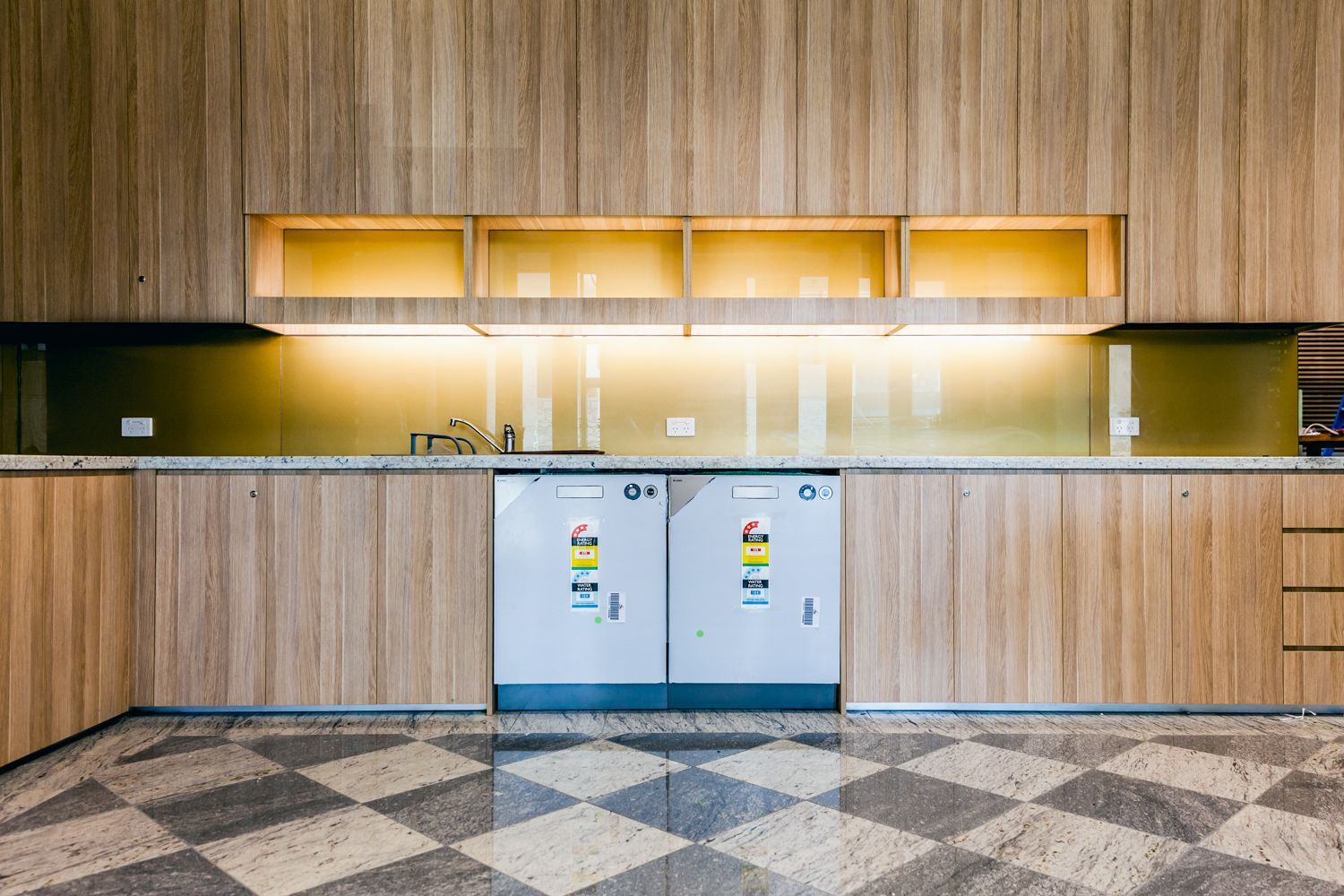 Modern Kitchen With Wood Cabinets — PKJ Design in Unanderra, NSW