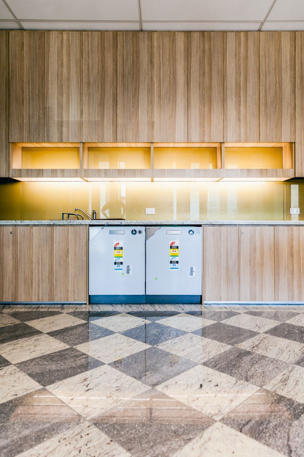 Modern Kitchen With Wood Cabinets — PKJ Design in Unanderra, NSW