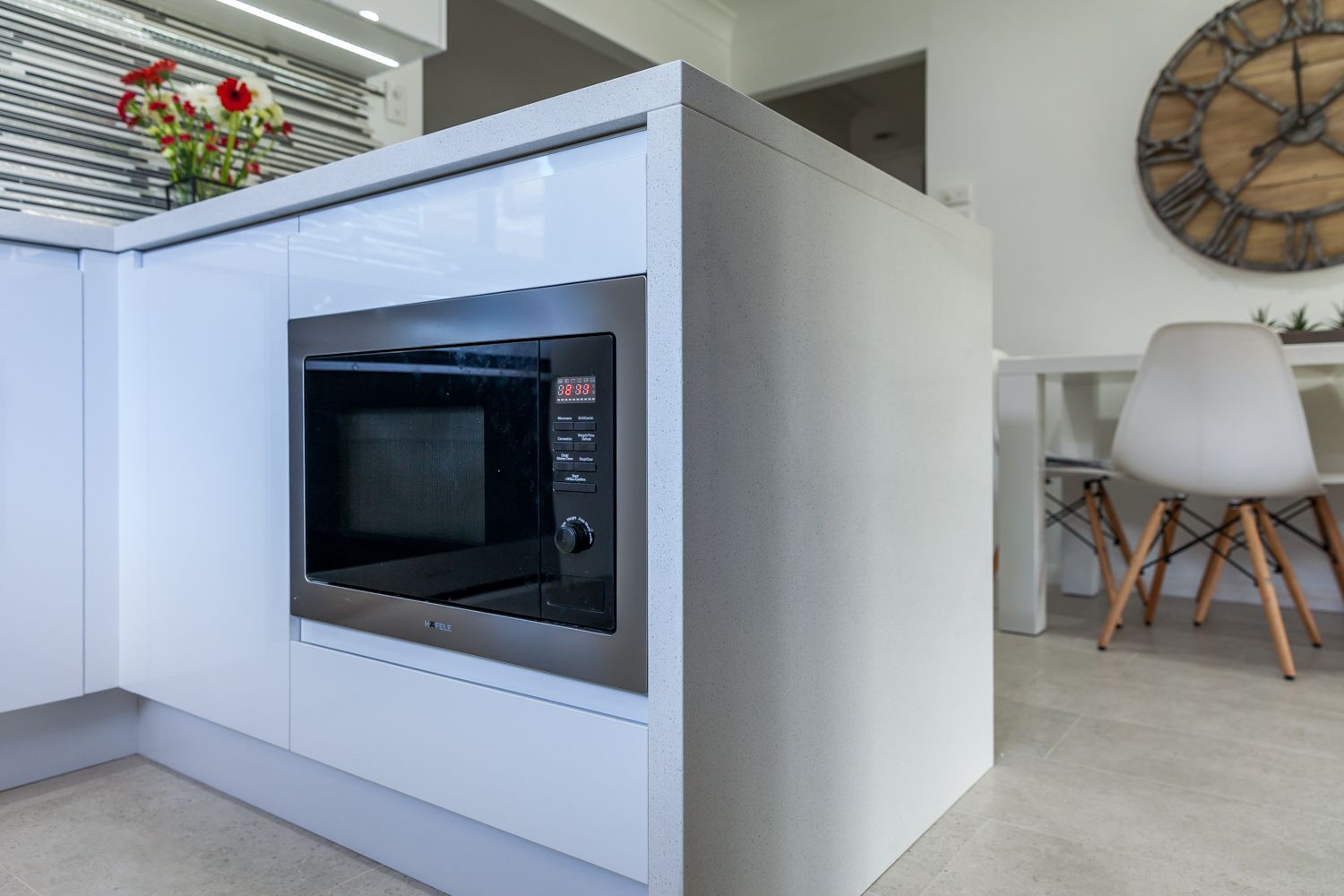 Modern Kitchen With Built-in Black Microwave — PKJ Design in Unanderra, NSW