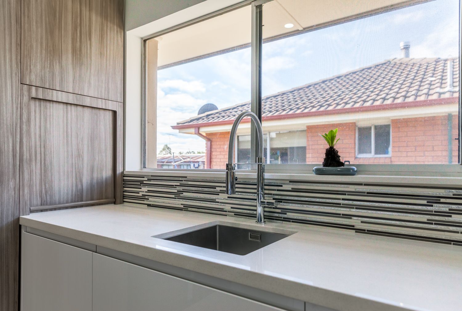 Modern Kitchen Sink Beneath a Window — PKJ Design in Unanderra, NSW