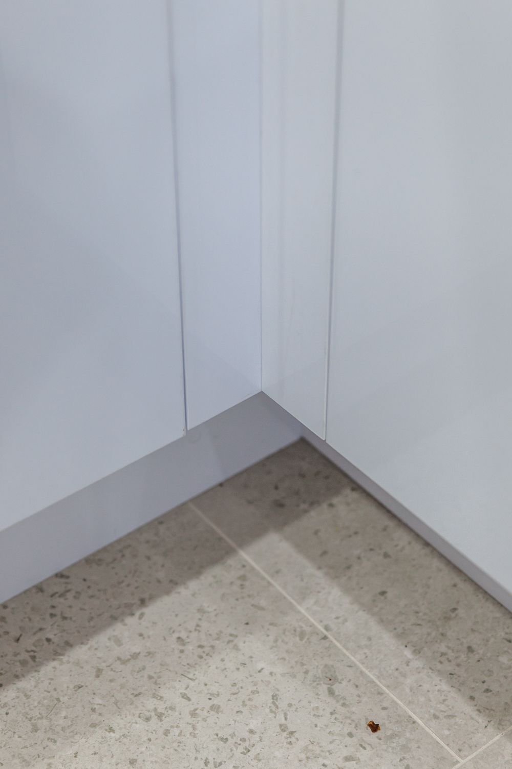 Corner of a Room With White Cabinets — PKJ Design in Unanderra, NSW