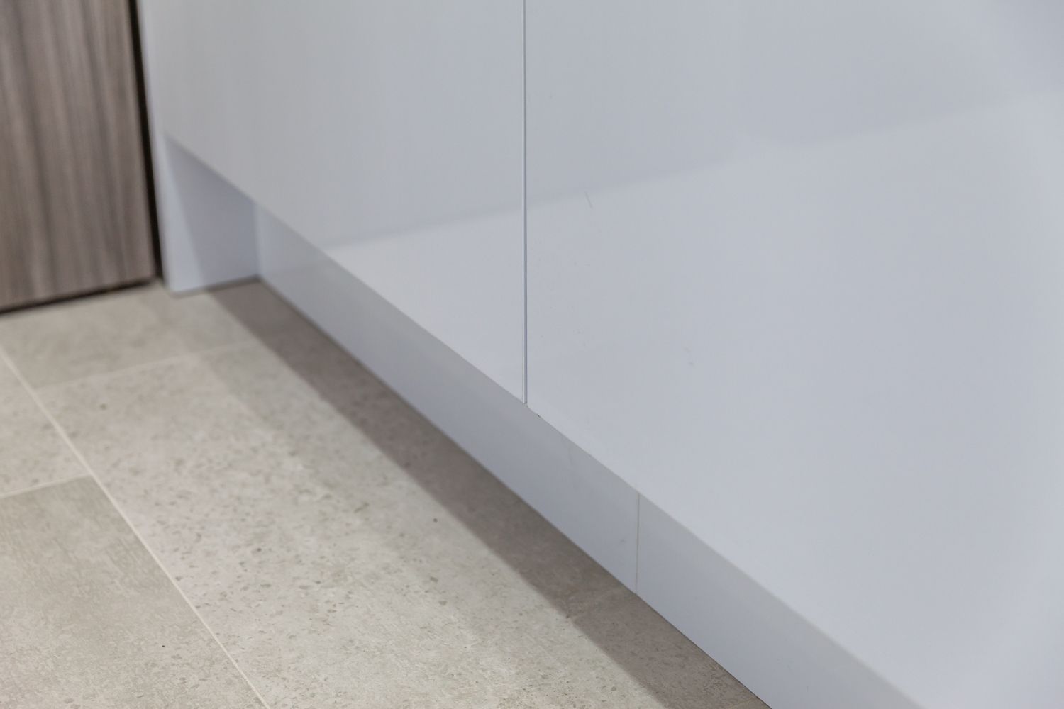 White Cabinet BASE Above Beige Tile Floor — PKJ Design in Unanderra, NSW