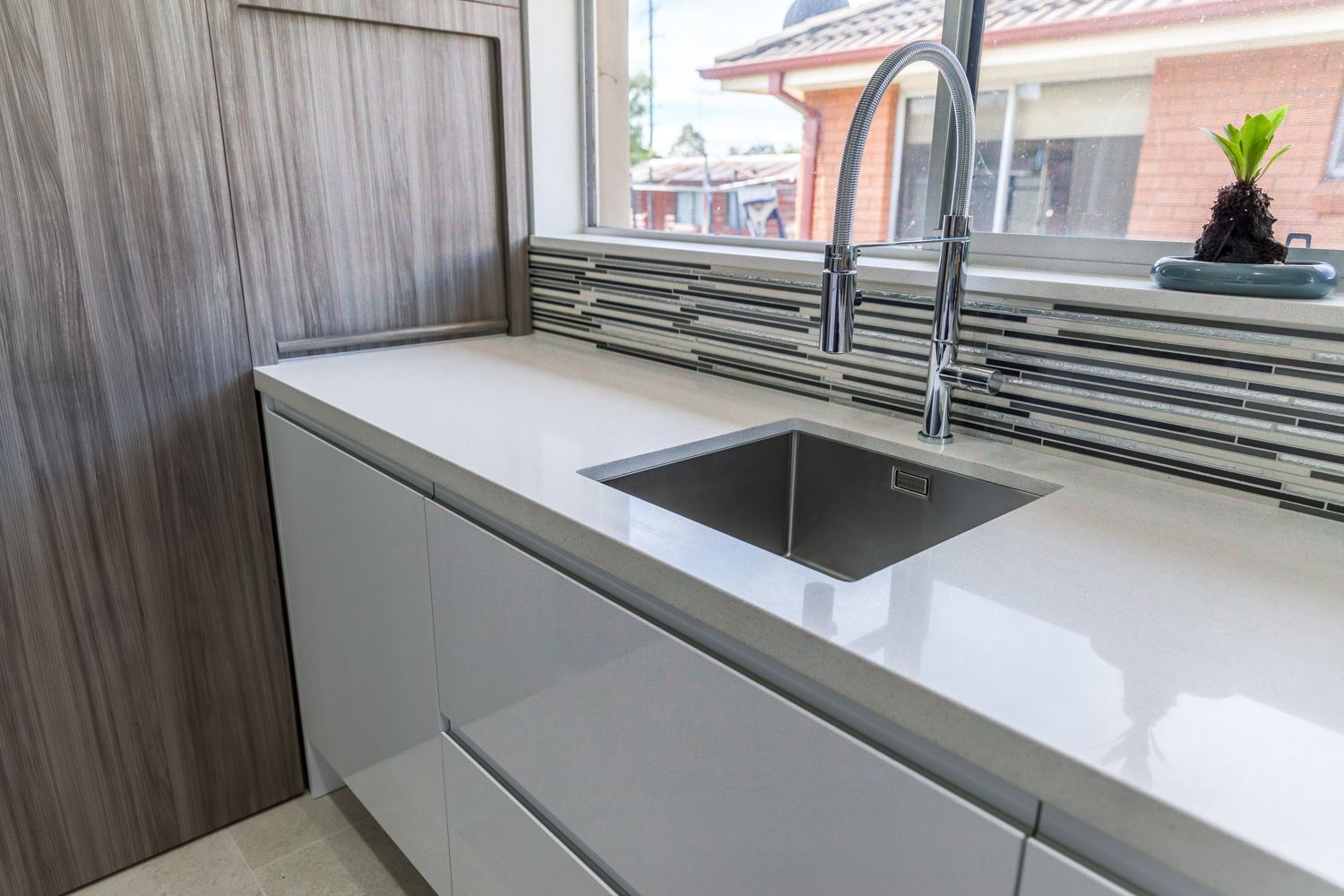 Modern Kitchen Sink With White Countertop — PKJ Design in Unanderra, NSW