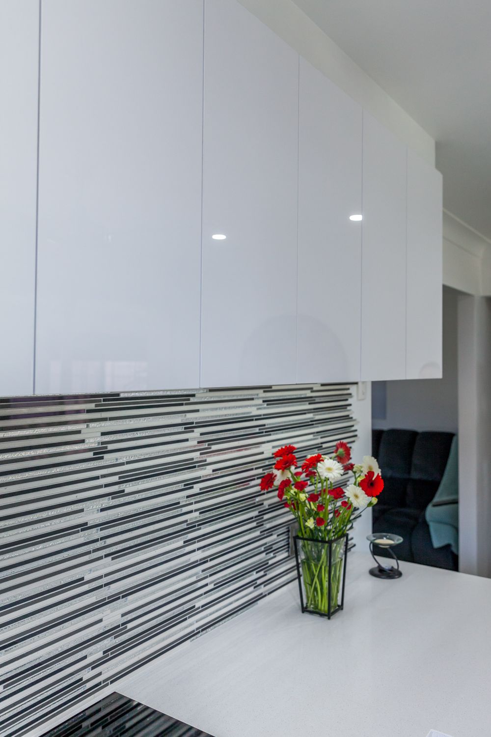 Modern White Kitchen With Glossy Cabinets — PKJ Design in Unanderra, NSW