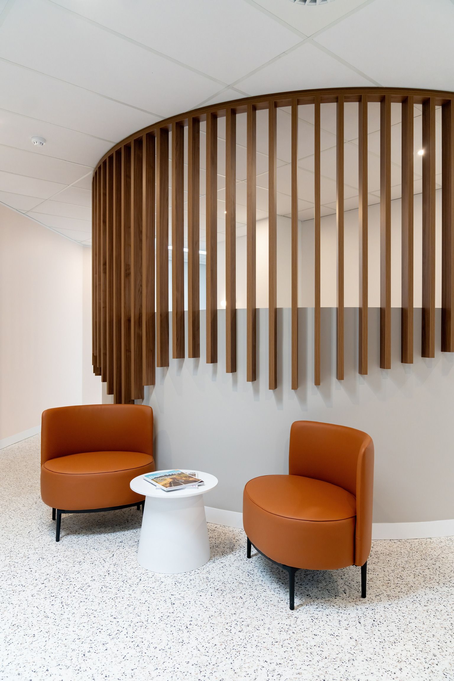 Modern Lounge With Two Orange Chairs — PKJ Design in Unanderra, NSW