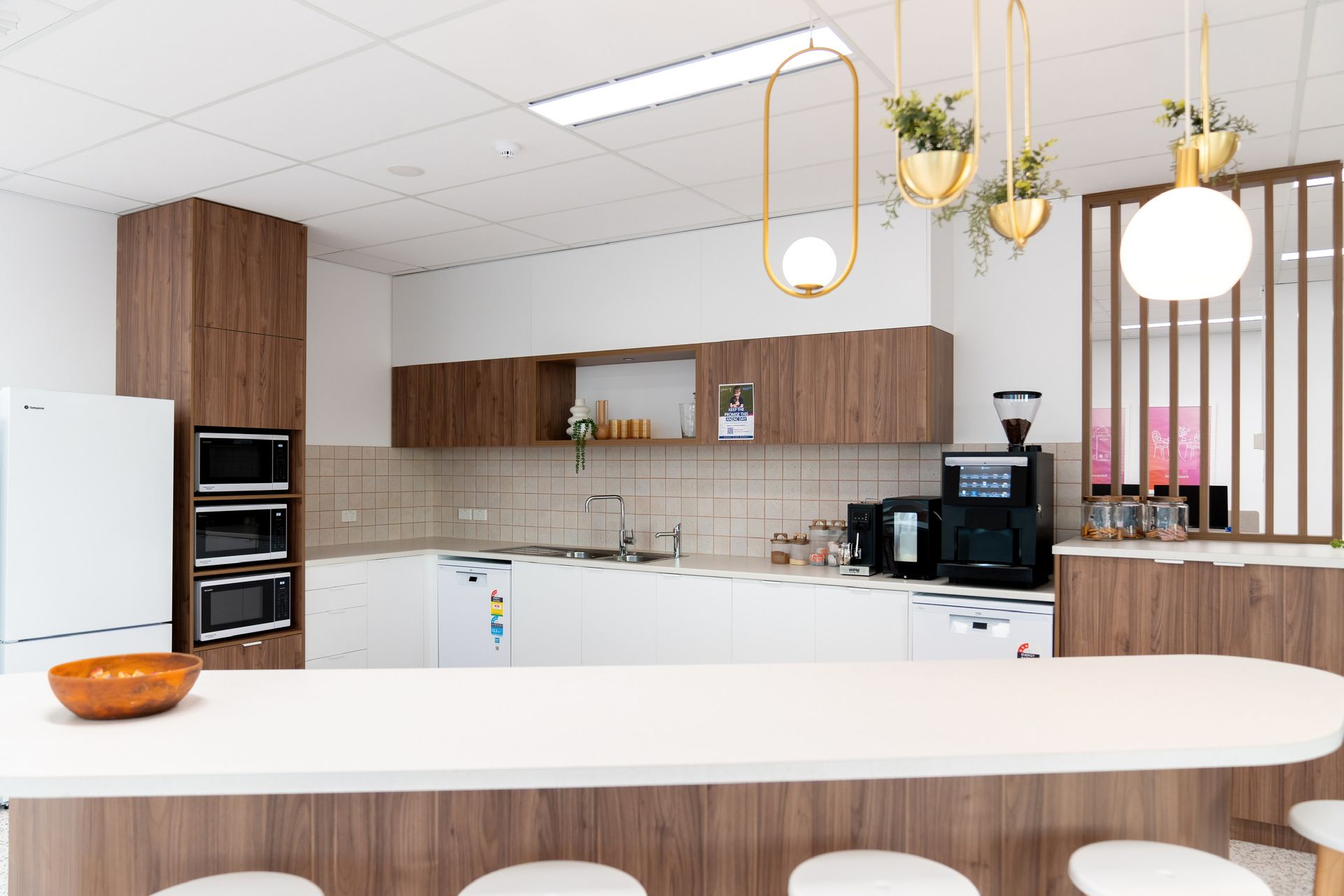 Modern White Kitchen With Wood Cabinets — PKJ Design in Unanderra, NSW