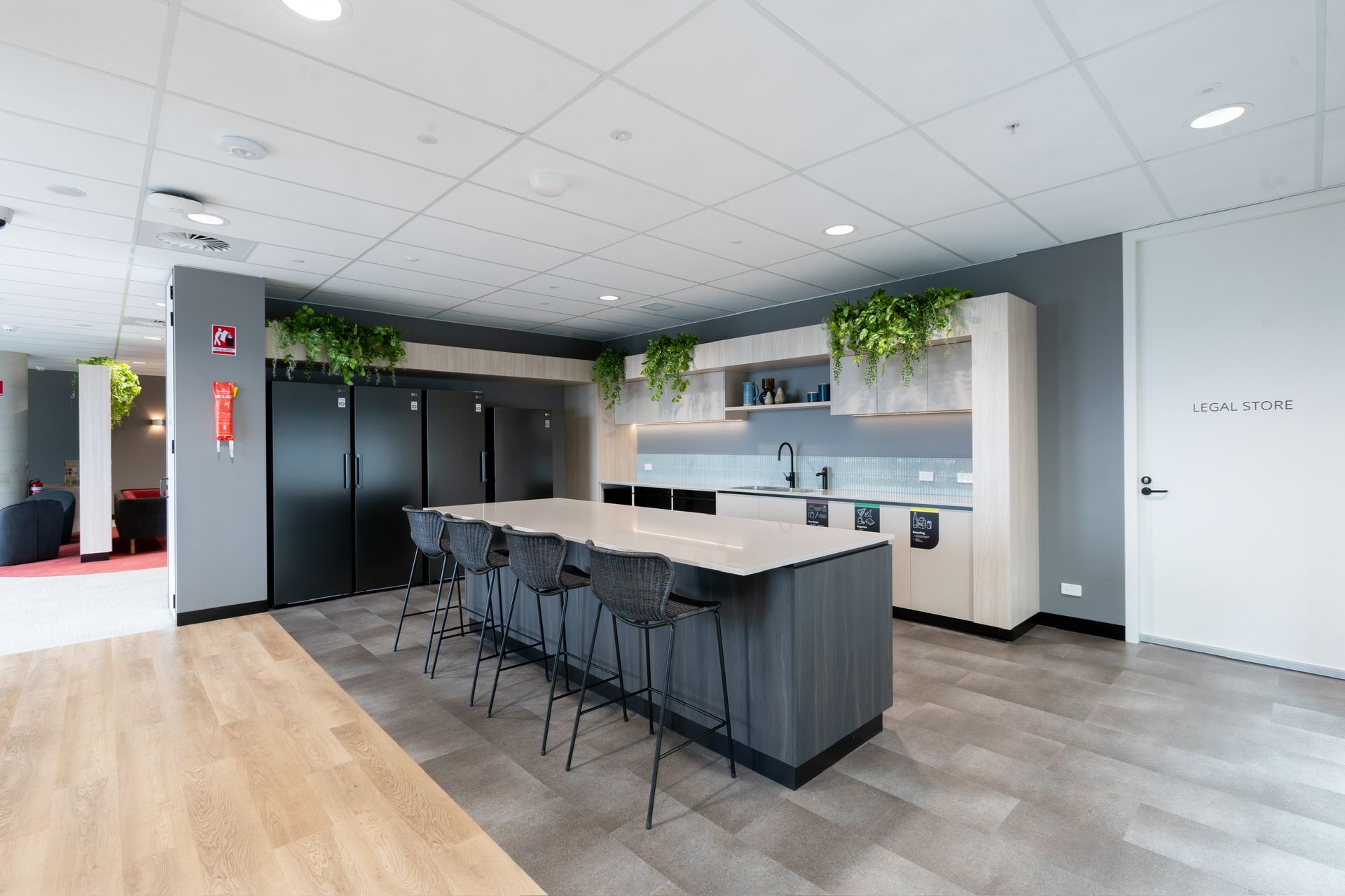 Modern Office Break Room With Black Chairs — PKJ Design in Unanderra, NSW