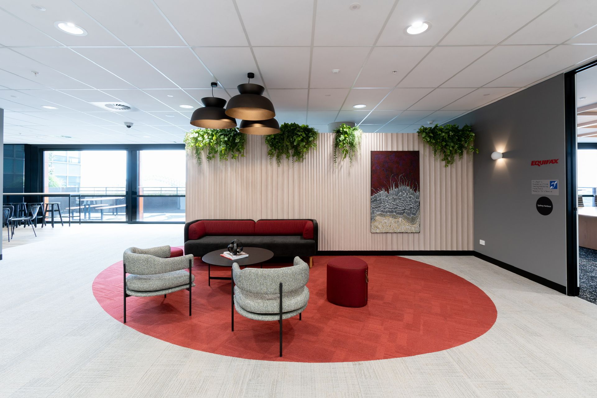 Modern Lounge With Red Circular Rug — PKJ Design in Unanderra, NSW
