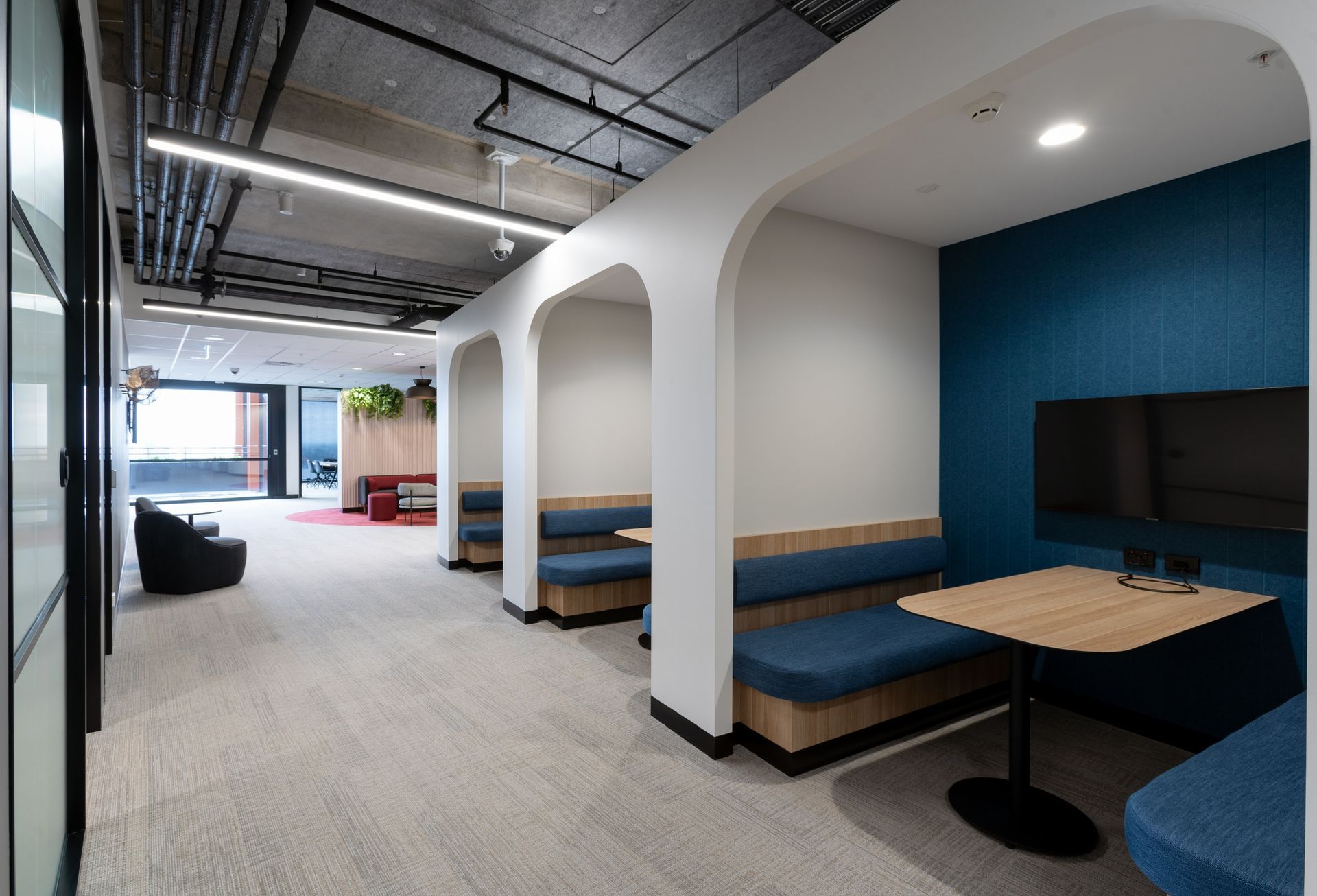 Modern Office Lounge With Blue Booths — PKJ Design in Unanderra, NSW