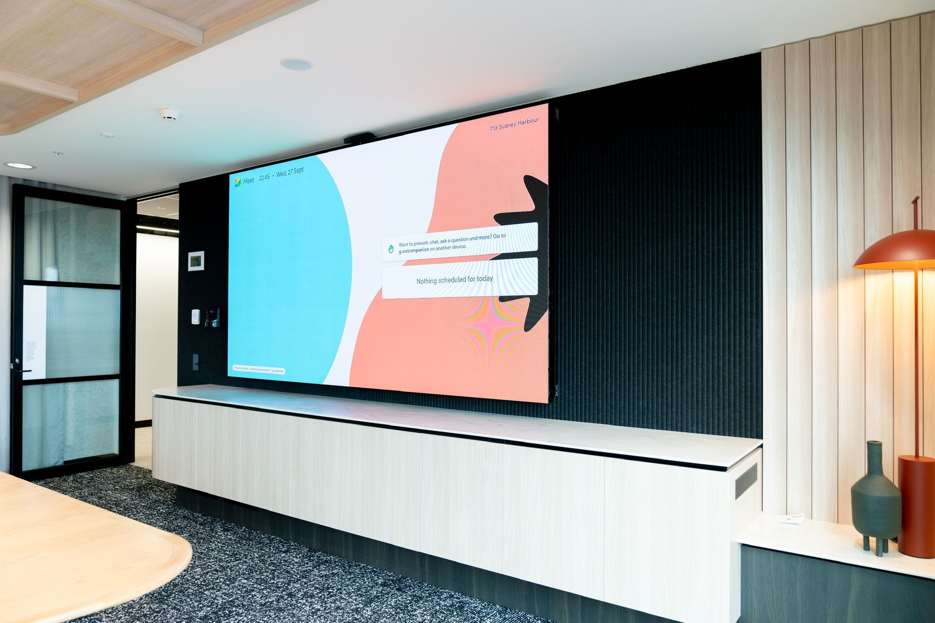 Modern Meeting Room With a Large Presentation Screen — PKJ Design in Unanderra, NSW