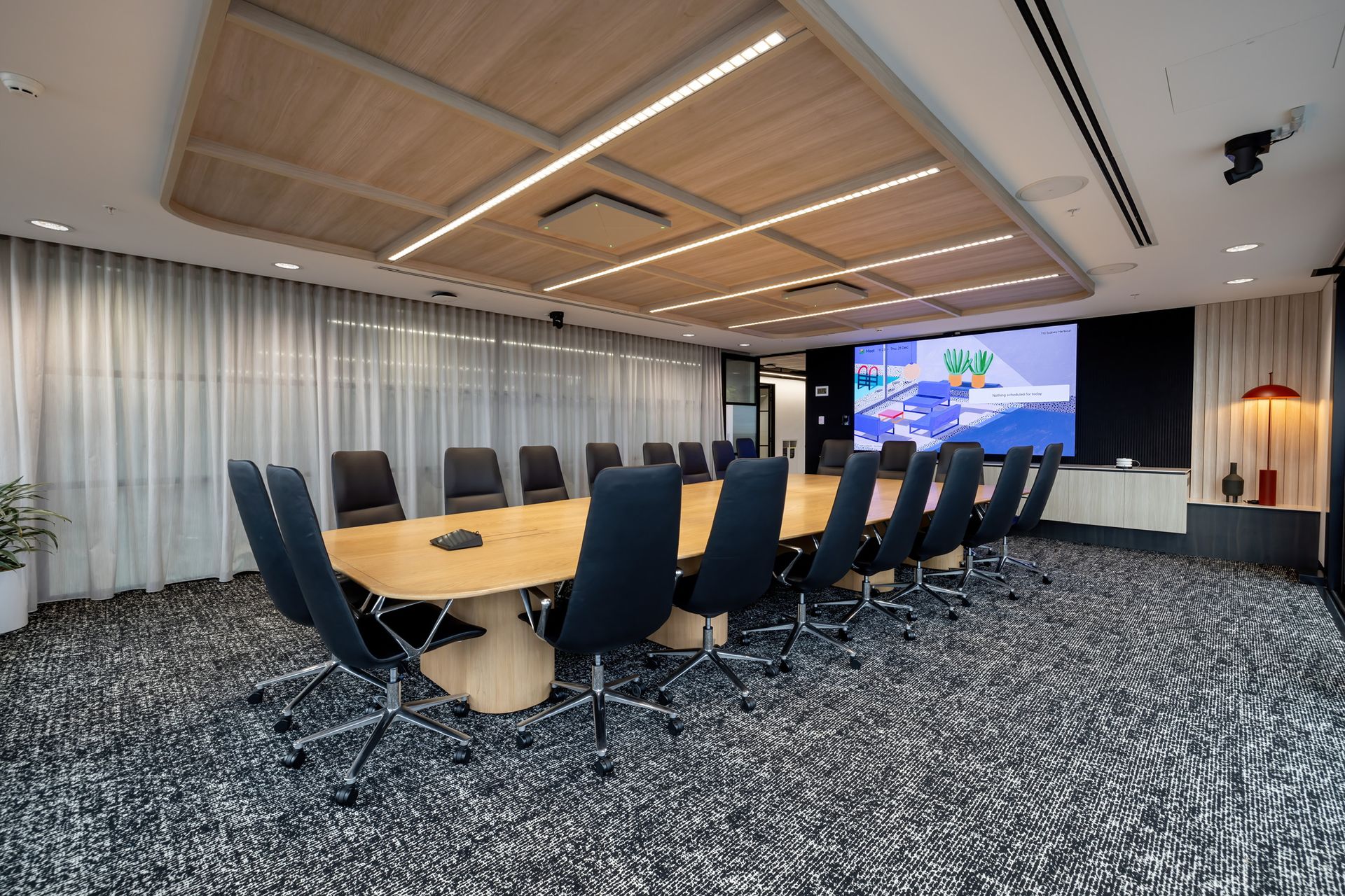 Modern Conference Room With a Long Wooden Table — PKJ Design in Unanderra, NSW