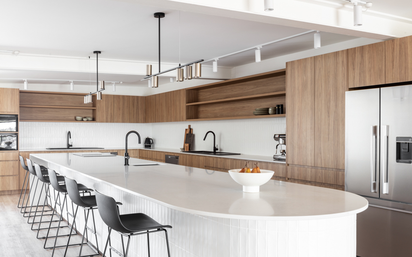 Modern Kitchen With White Island, Black Bar Stools — PKJ Design in Unanderra, NSW