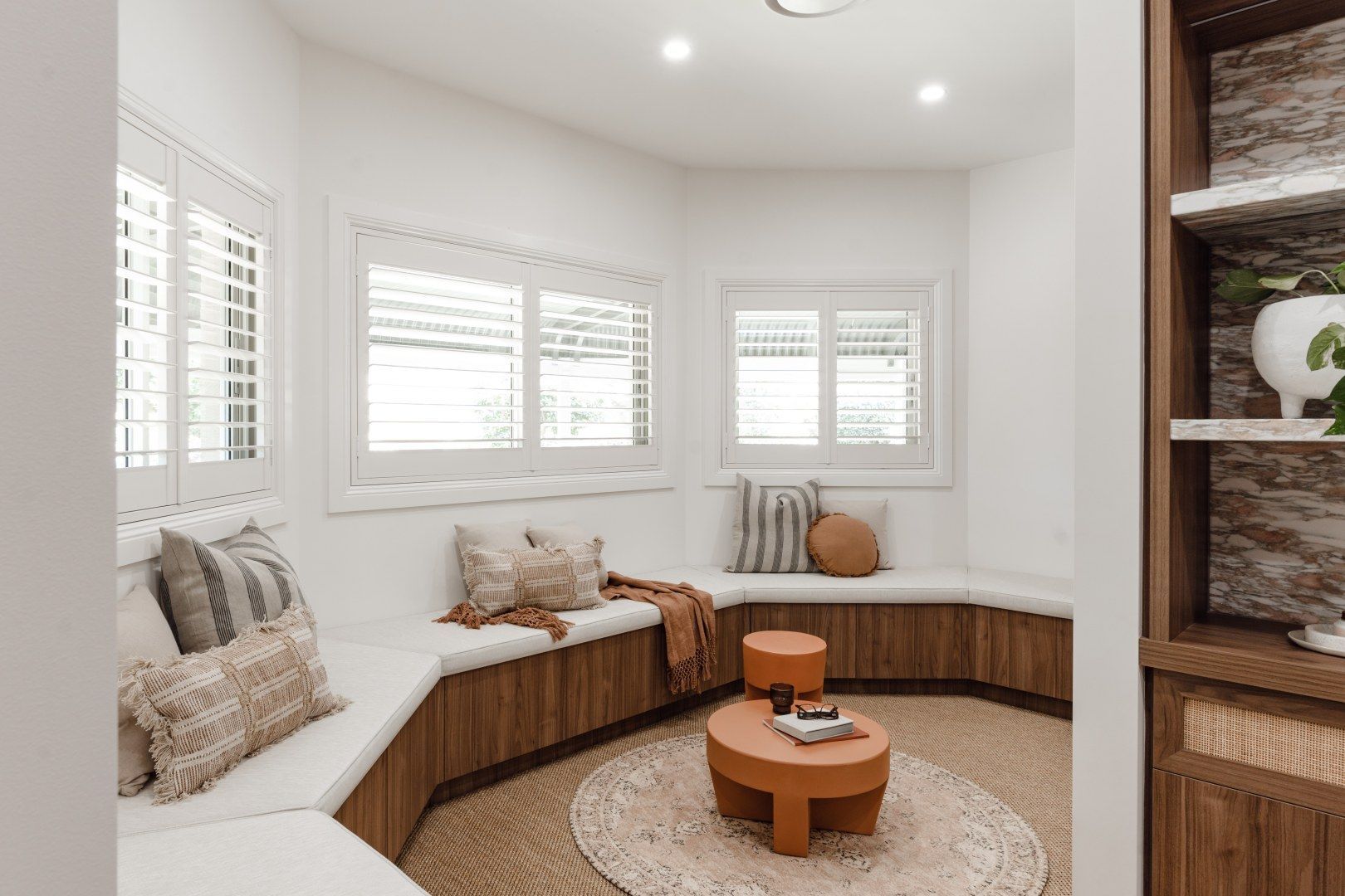 Cozy White Built-in Window Seat With Beige Cushions — PKJ Design in Unanderra, NSW