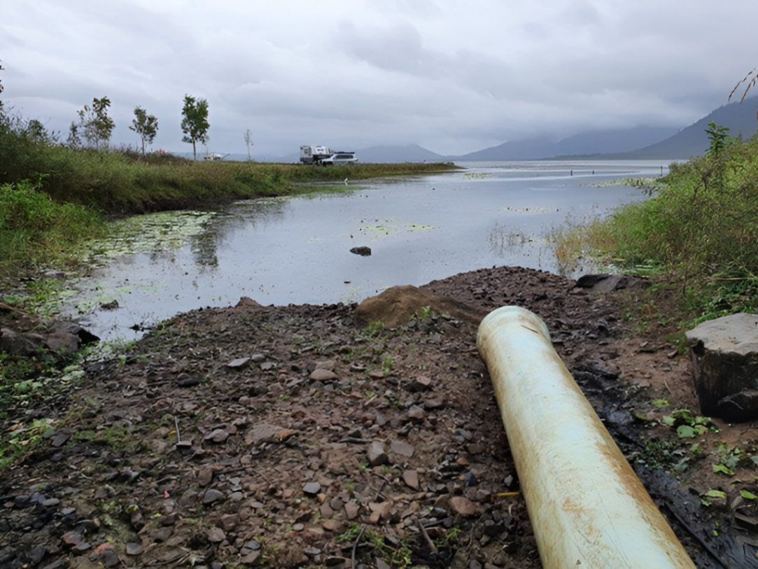 A Cement Pipe Near a Lake — Hillery Group in Bowen, QLD
