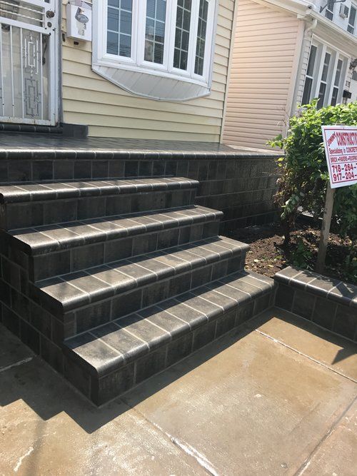 A set of stairs leading up to a house.