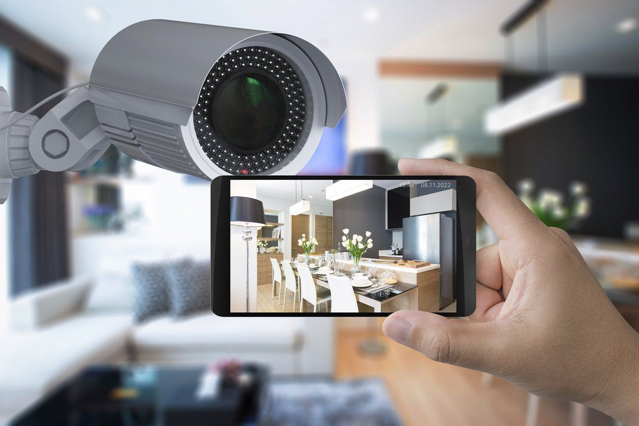 The Hik-Connect phone give access from anywhere A home security camera in a modern house, The hik-connect app of a home security camera