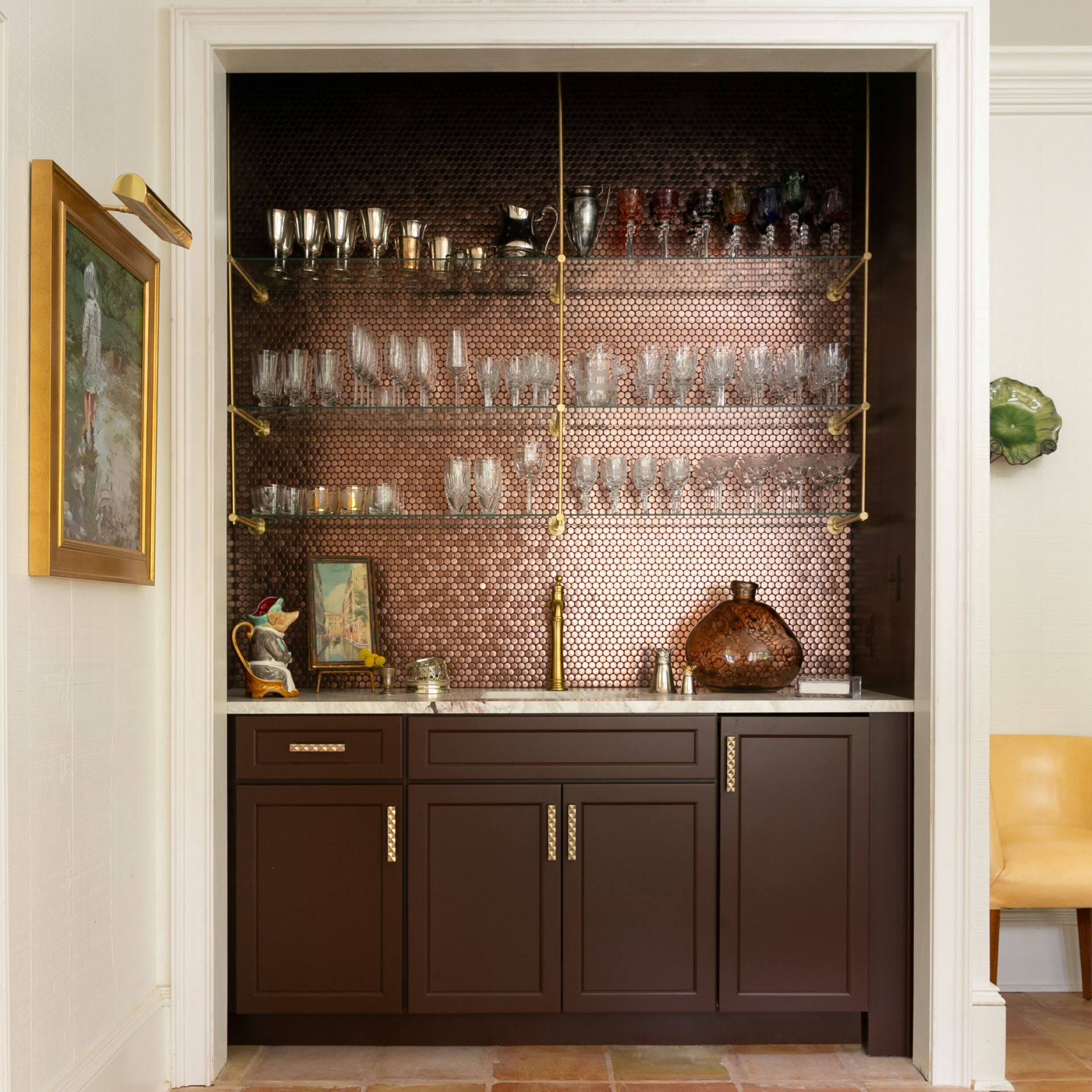 A laundry room with a washer and dryer and a sink.
