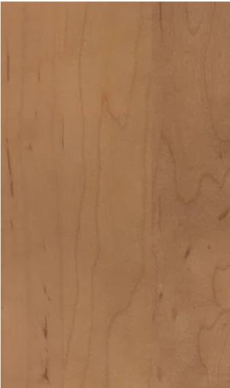 Close-up of a light brown wood-grain surface.