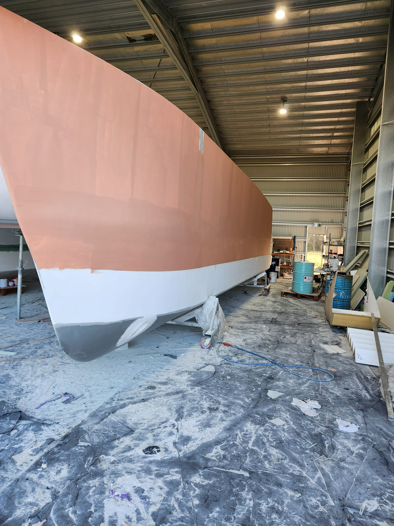 A Boat is Being Painted in a Warehouse — Baran Yachting in Sunshine Coast, QLD