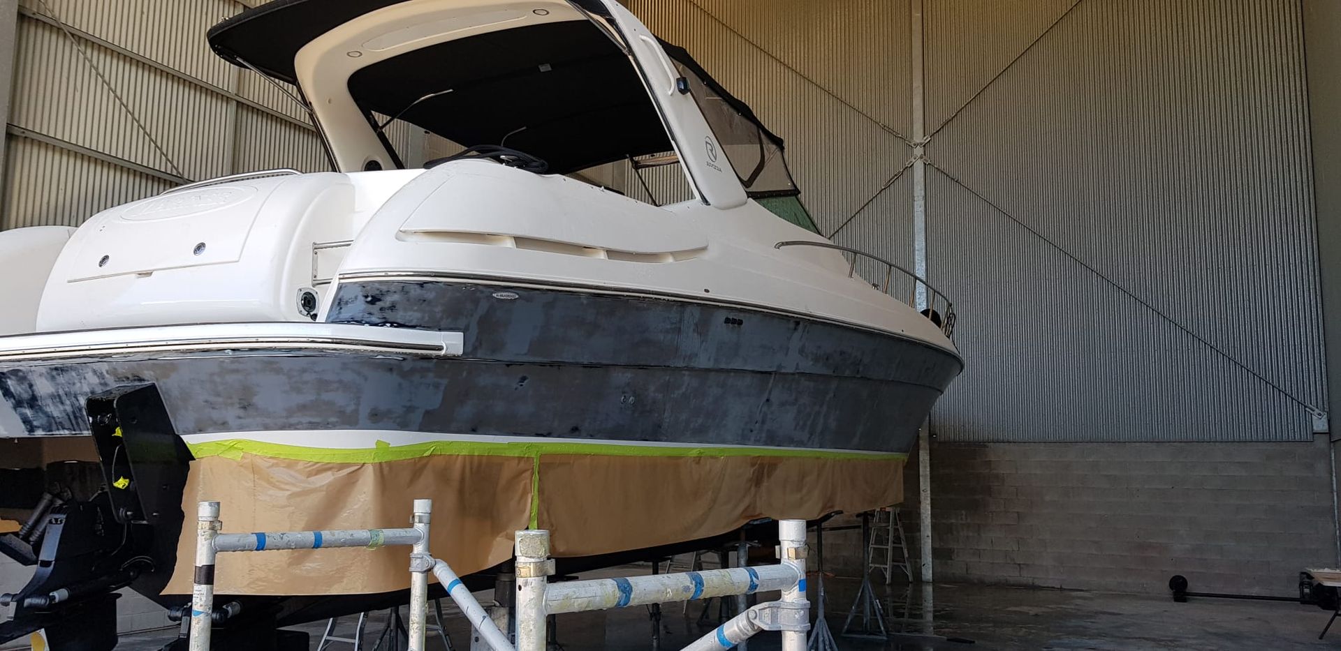 A Boat is Being Painted in a Warehouse — Baran Yachting in Noosa Heads, QLD