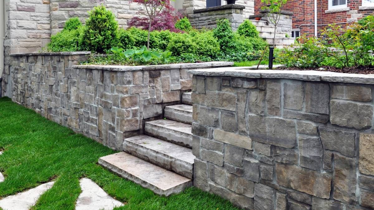 Retaining wall and integrated steps in a garden near Campbellsville, KY