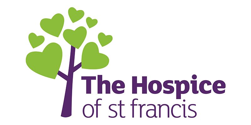 The hospice of st francis logo has a tree with hearts on it.